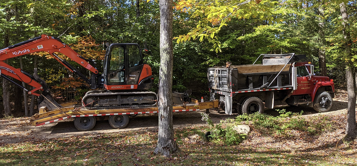 Dump truck and excavator